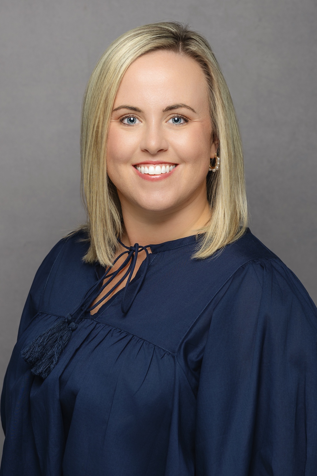 a person wearing a purple shirt