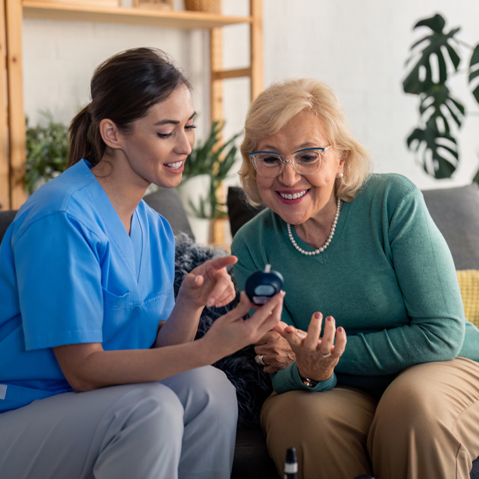 a group of people sitting posing for the camera