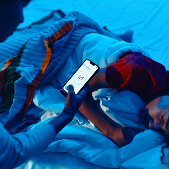 a person lying on a bed